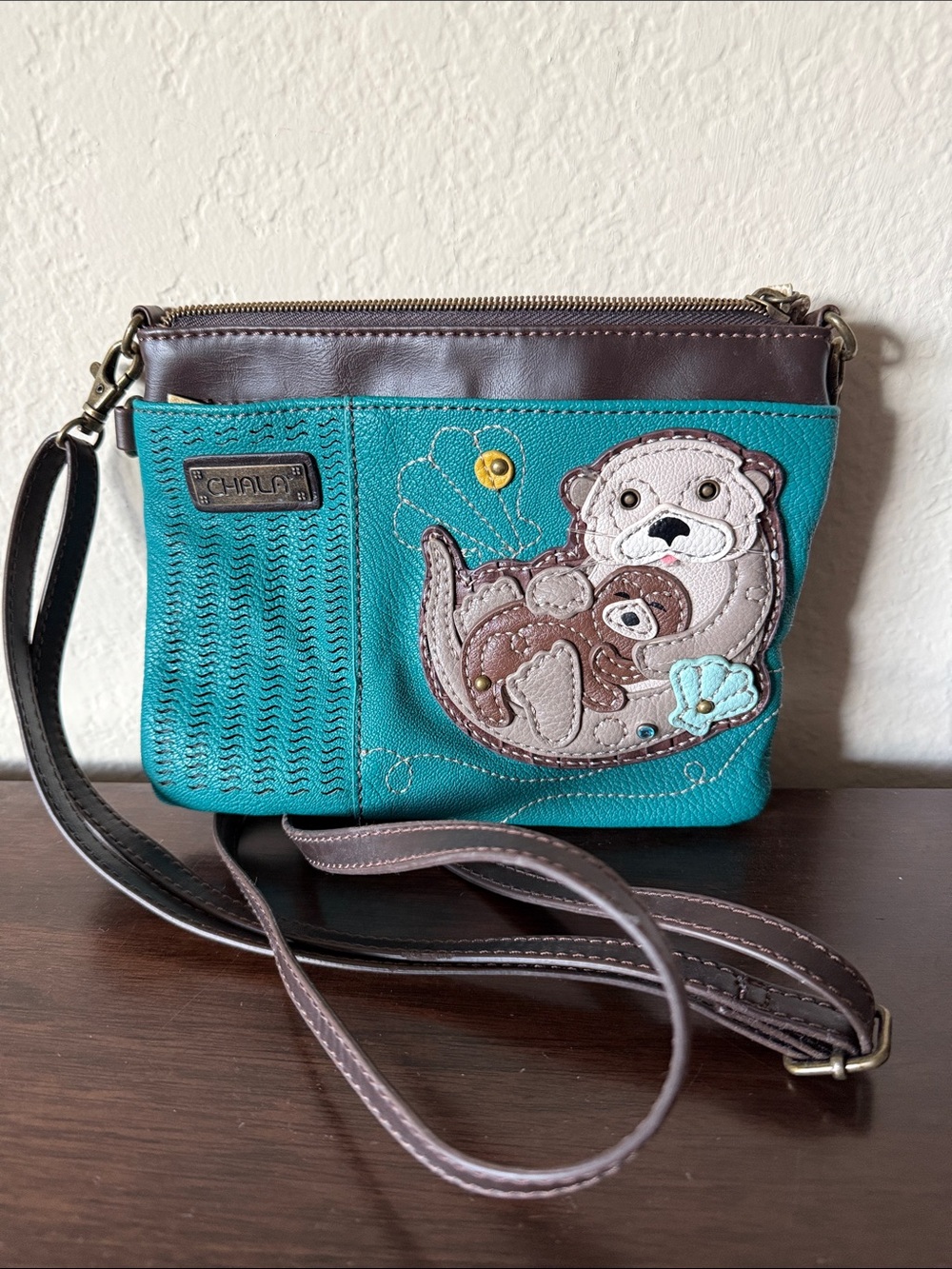 Chala Teal Crossbody with Otter